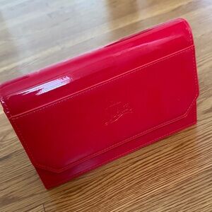 Christian Louboutin Red Clutch. Please see last photo.